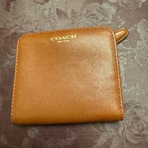 Leather brown authentic coach leather wallet great condition.